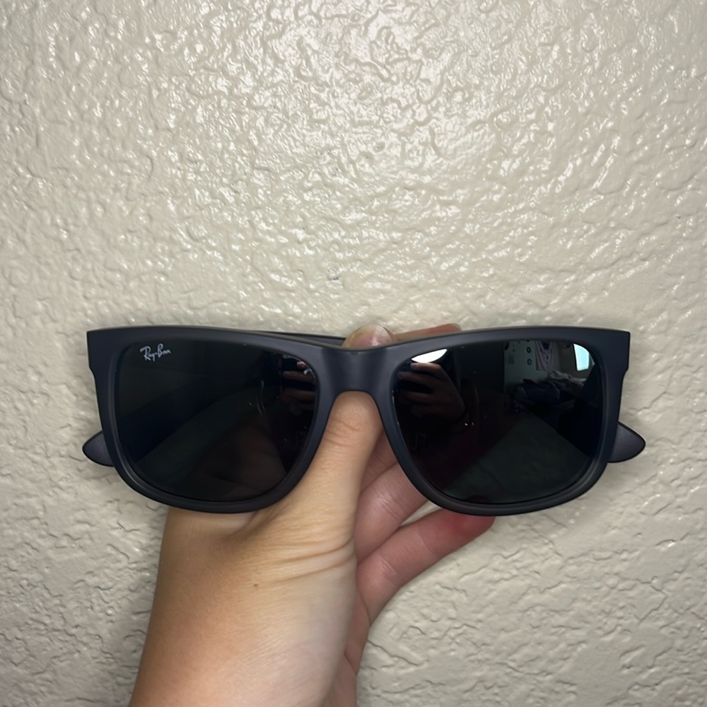 Pair of Black Ray Ban Sunglasses